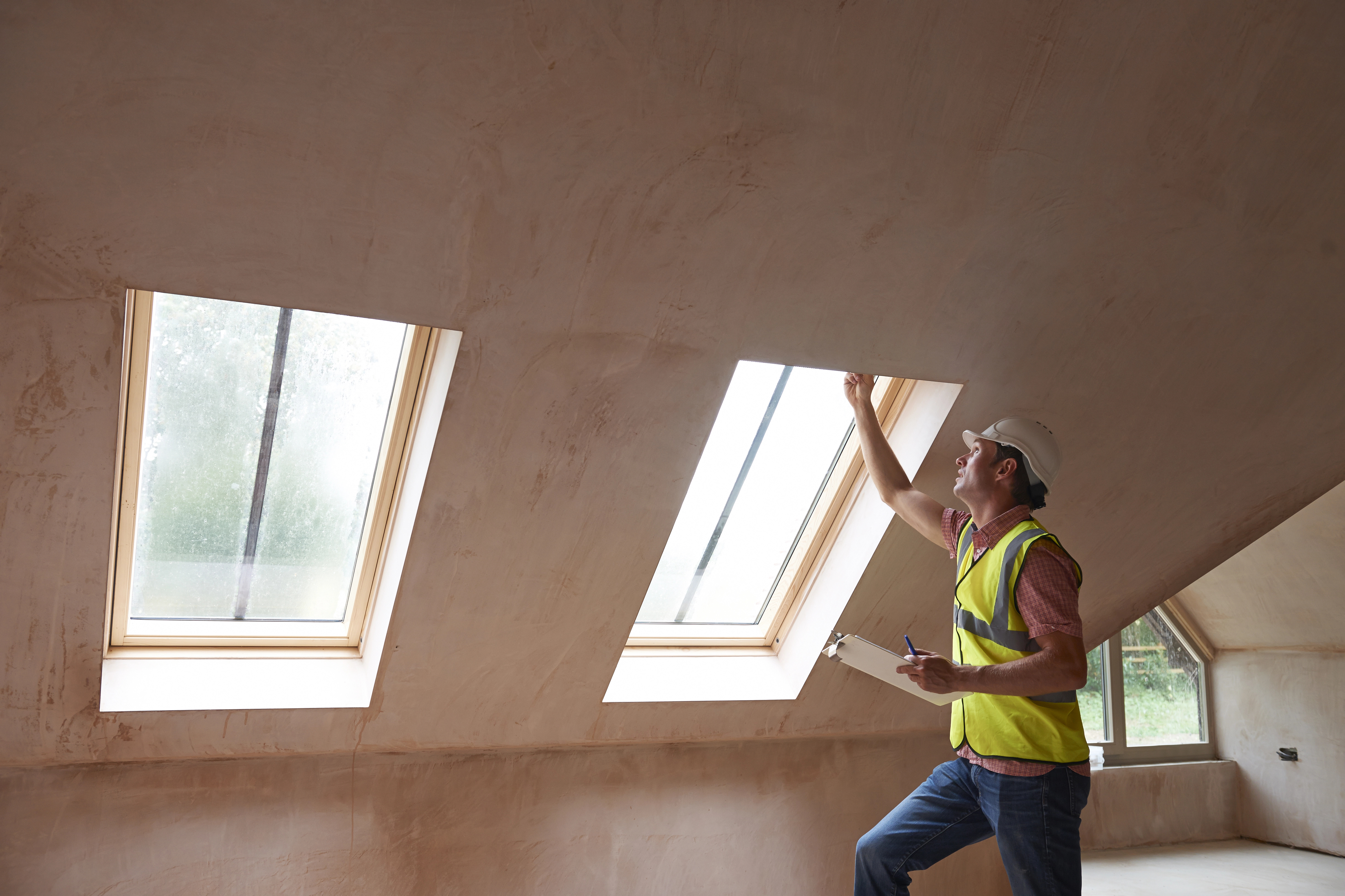 Roofing inspector at residential property